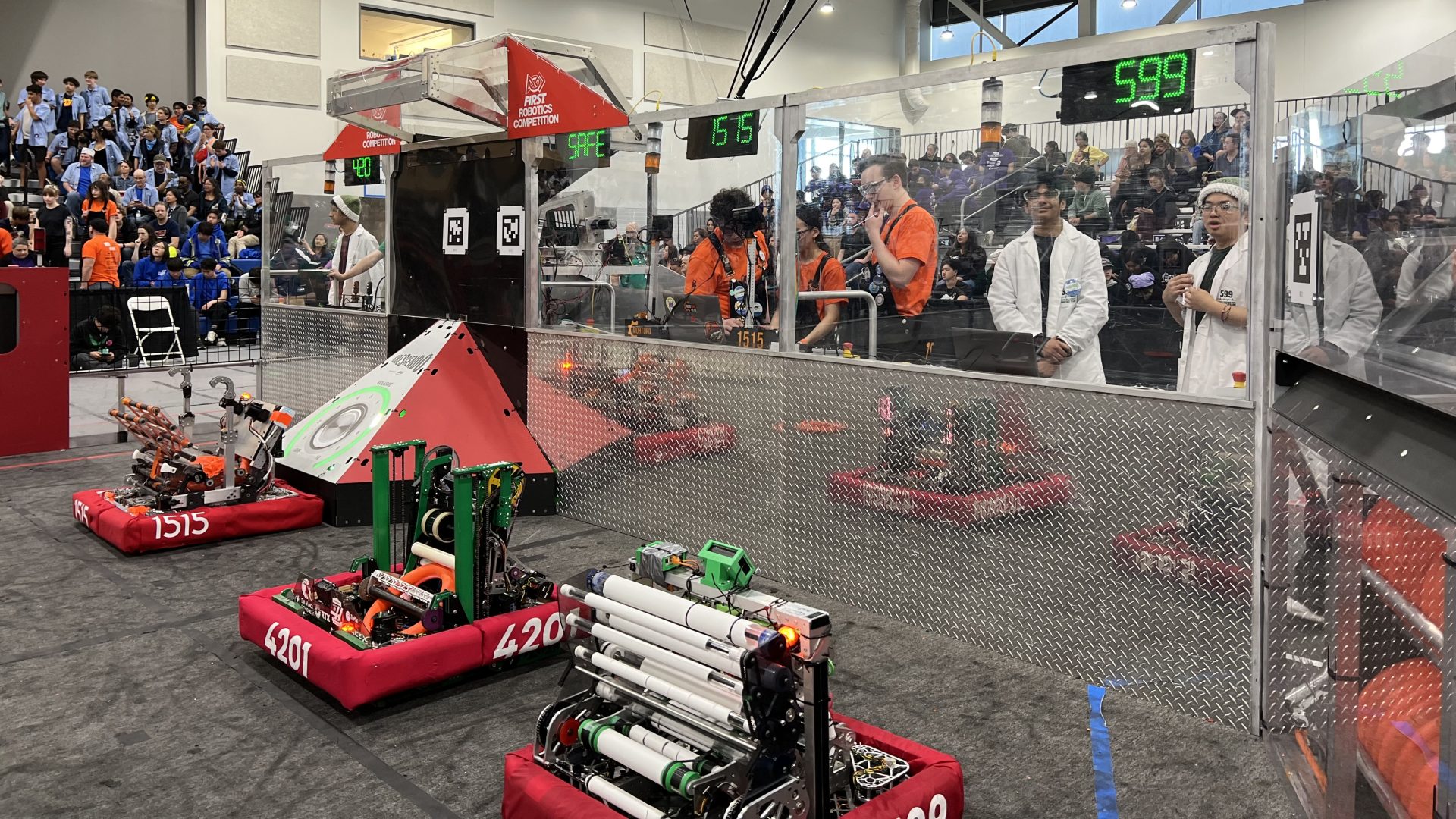Teams prepare for a playoff match at the L.A. regional FIRST Robotics Competition in El Segundo on March 17.
