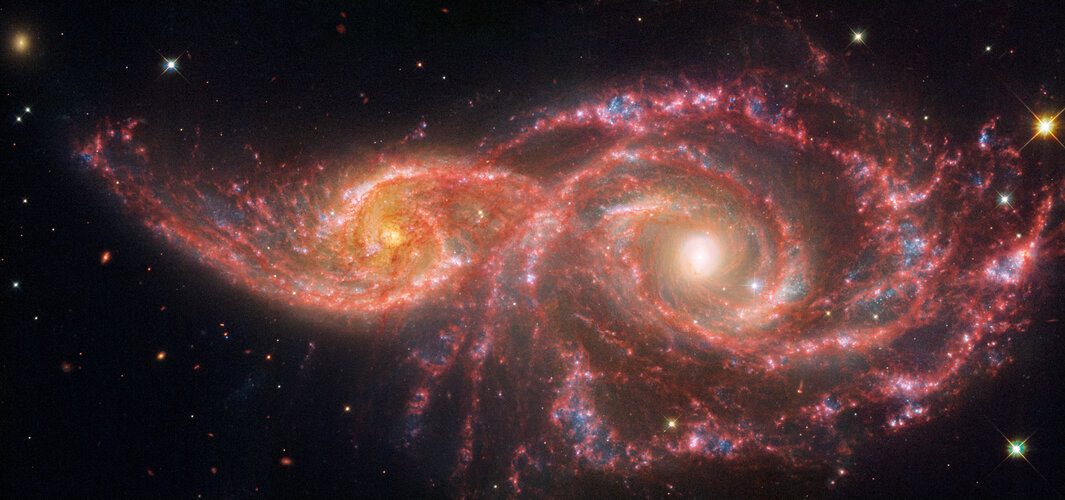 Webb and Hubble images overlapping