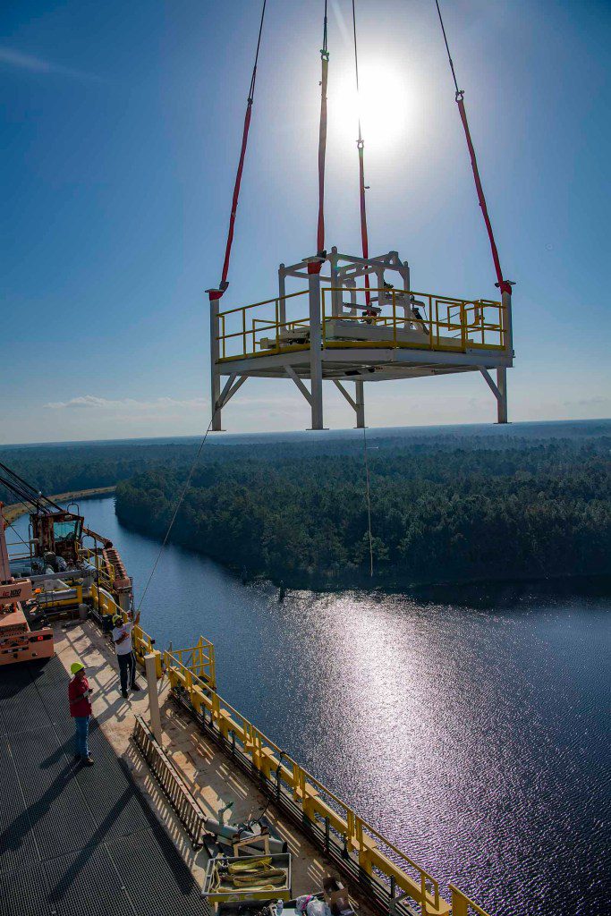 A pair of umbilical support structures needed for future testing of NASA’s exploration upper stage (EUS) are shown suspended in air