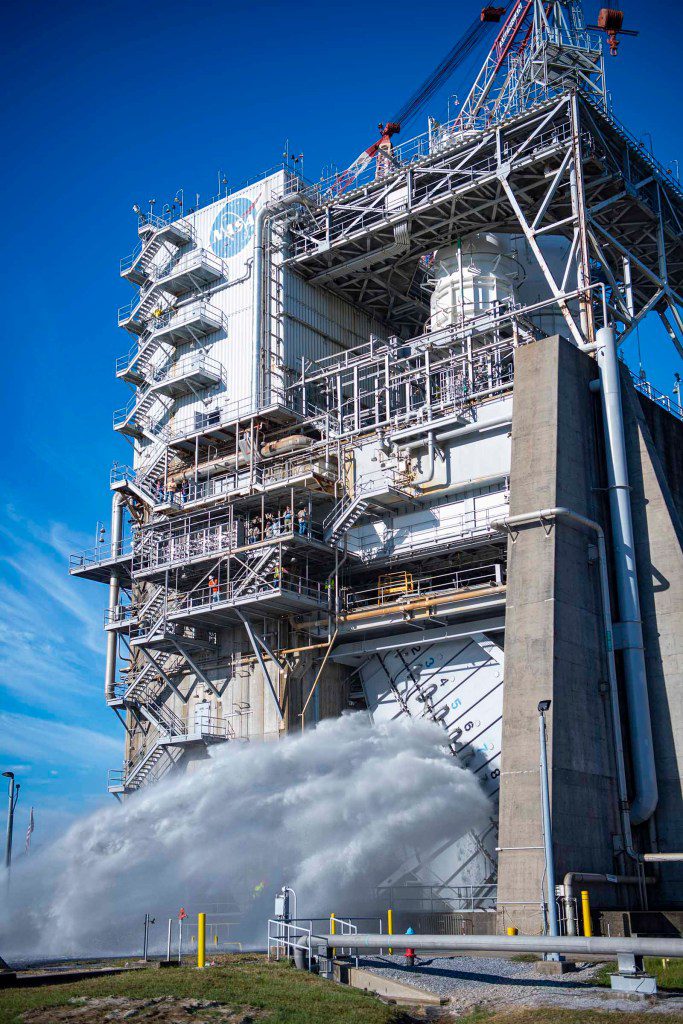 steam and water erupt during water flow system flush on the Fred Haise Test Stand