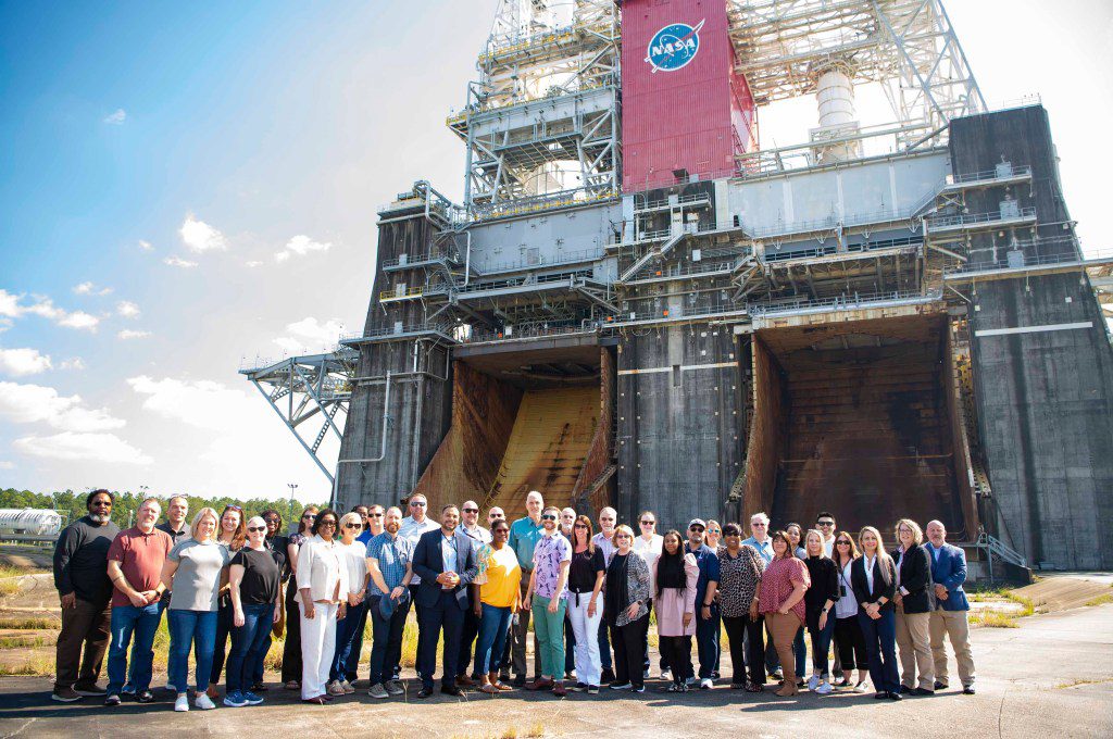 The NASA Office of the Chief Information Officer Integrated Design and Assurance Systems team are shown at the Thad Cochran Test Stand