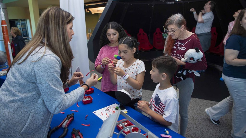 Young attendees enjoy activities provided by participating organizations of the NASA Stennis federal city.