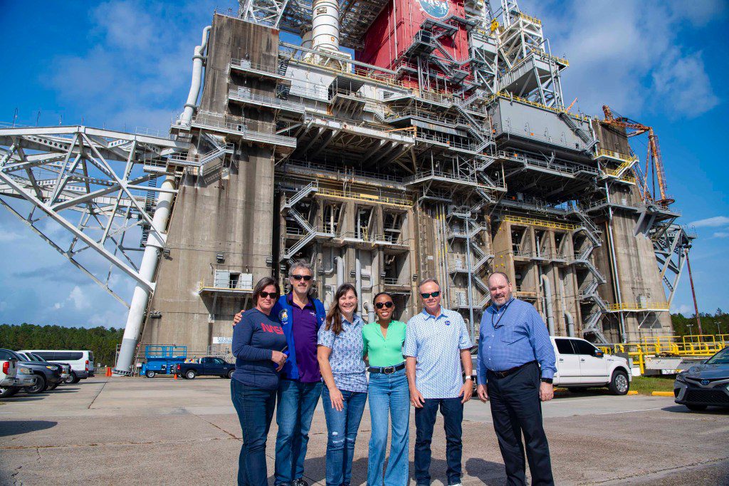 Members of the NASA Office of the Chief Information Officer Strategy and Architecture Office team are shown at the Thad Cochran Test Stand during a tour of NASA Stennis