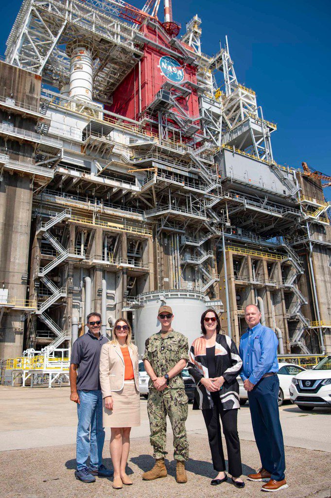 B-2 Stand Director Ryan Roberts, Leah Thorstenson, foreign policy advisor with the U.S. Marines Corps. Forces South., Cmdr. Brendan Rok, chief of the U.S. Navy Office of Defense Cooperation at the U.S. Embassy in Montevideo, Uruguay, Heide Fulton, U.S. Ambassador to the Oriental Republic of Uruguay, and NASA Stennis Director John Bailey visiting the B-2 side of the Thad Cochran Test Stand